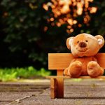 Teddy bear on a bench